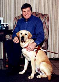 George and Nesbit graduation picture from Guide Dogs For the Blind, 1999